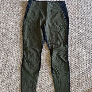 Olive green and black Athleta hiking pants